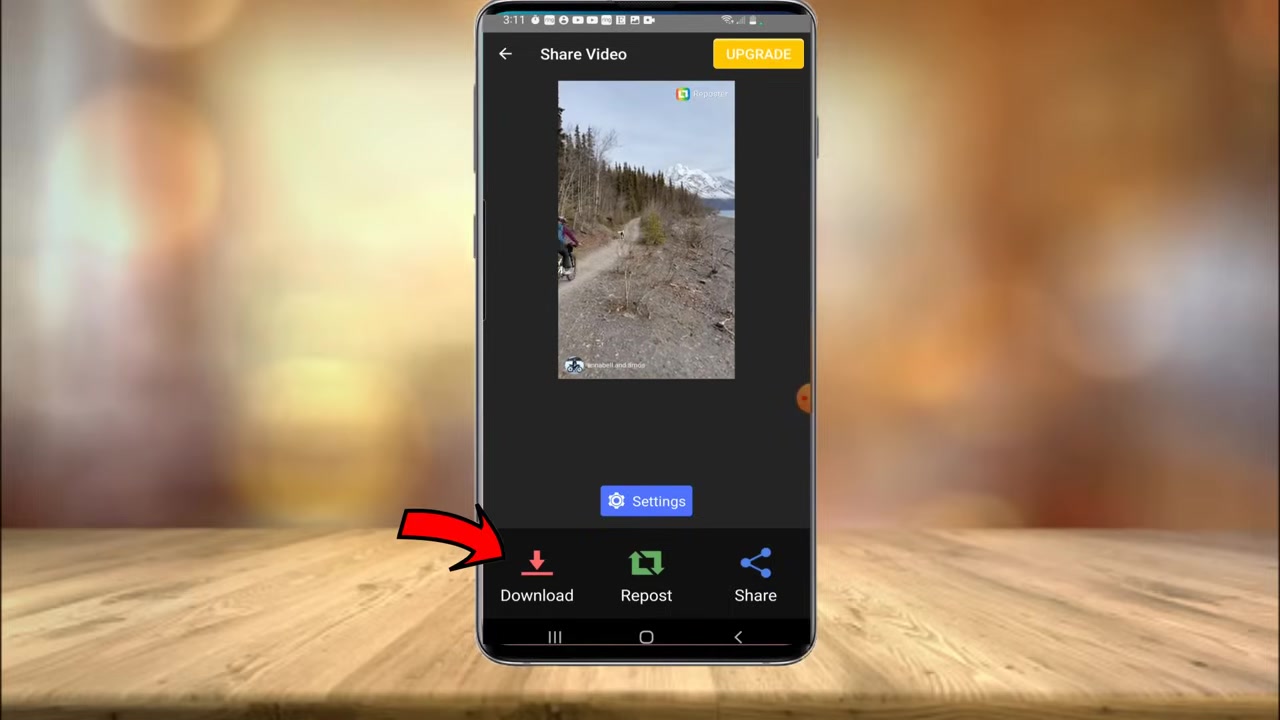 The screen inside the Repost app showing a video ready for download, with the "Download" button clearly visible in the bottom-left corner.