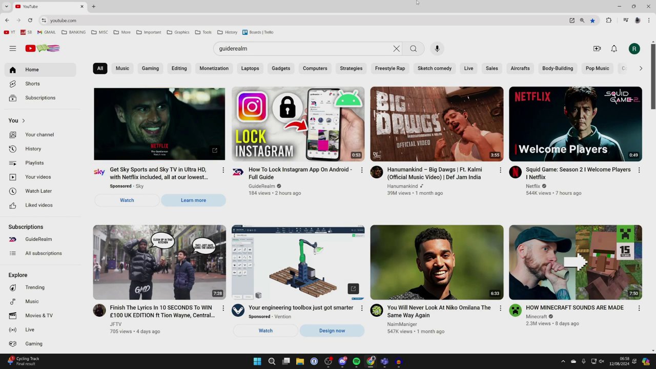 A laptop screen showing a YouTube homepage, indicating the starting point for finding a video to download.