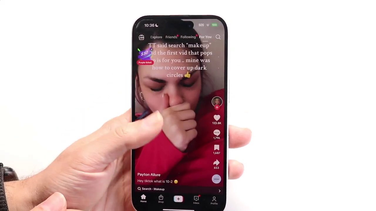 A user's finger swipes vertically through the vibrant 'For You Page' feed, showcasing various video previews.